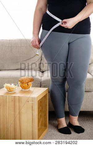 Weight Gain, Eating Problems, Stress, Compulsive Overeating. Overweight Woman With French Fries, Chi