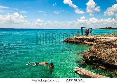 Tourists Practices Snorkeling, At Playa Larga, Bay Of Pigs, Cuba