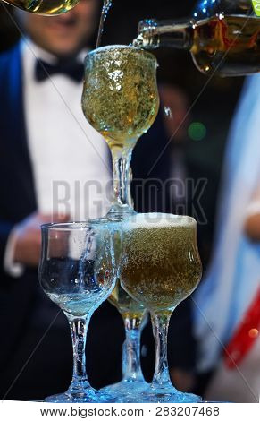 Wedding Background.happy Newlyweds Couple Drink Wedding Champagne Wine.decorated Crystal Glasses.