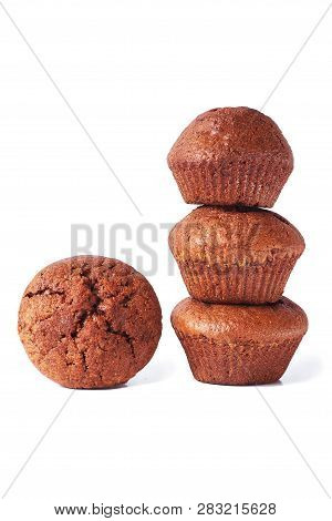 A Chocolate Muffin With Dark Test Isolated On A White Background.