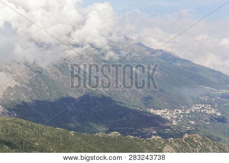 Mountains With Clouds In Central Corsica, France.