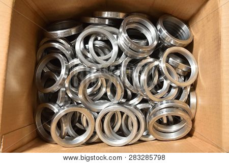 Round Rings With Internal Thread For Valve Manufacture In The Factory. Many Round Rings For Industri