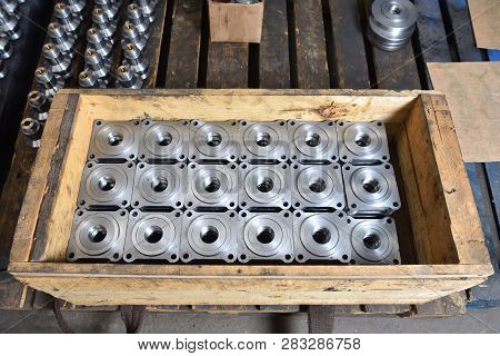 Square Metal Part And Base For Valve Creation. The Metal Part Machined On The Milling Machine And Th