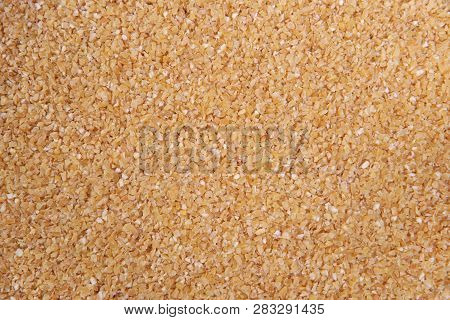 Wheat Groats. Top View. Food Background. A Scattering Of Wheat Groats. Healthy Food. Natural Food.