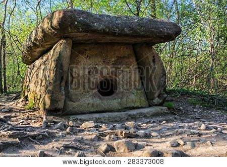 Big Stone Pshada Dolmen In Summer Caucasus Mountain Forest On Sunny Day. Ancient Megalithic Tomb Wit