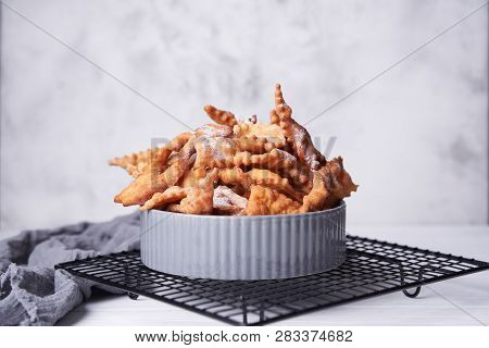 Brushwood - Russian Traditional Cookies With Powdered Sugar. Food Consept. Plate With Hvorost On Whi