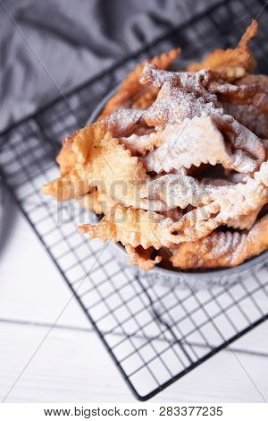 Brushwood - Russian Traditional Cookies With Powdered Sugar. Food Consept. Plate With Hvorost On Whi