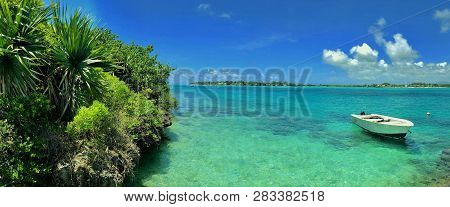 Boat Next To Ile Aux Aigrettes On Mauritius