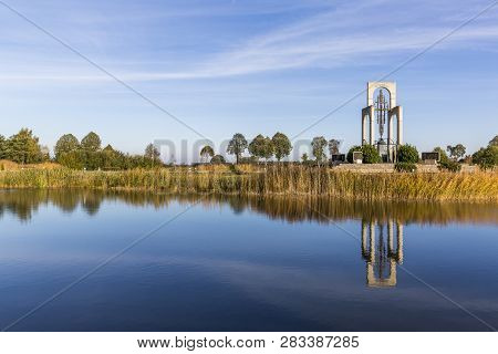 Beautiful Reflection Of European Liberty Bell In The Gifhorn Open Ait Museum
