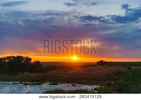 Evening Orange Sunset Over Valday Lake, Russia Nature Landscape Photography. Autumn Sunset, Outdoor 