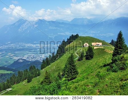 Alpine Livestock Farms And Stables On The Slopes Of Alvier Mountain In The Appenzell Alps Mountain R