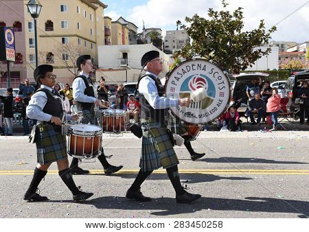 LOS ANGELES - FEBRUARY 9, 2019: Drummers from the Pasadena Scots march and play in the Los Angeles Chinese New Year Parade.