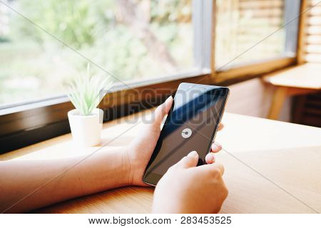 Chiang Mai, Thailand - Jan. 19,2019: Woman Holding Huawei With Uber Apps. Uber Is Smartphone App Tra
