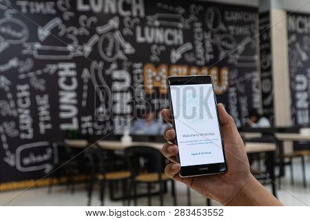 Chiang Mai, Thailand - Jan. 06,2019: Man Holding Oneplus 6 With Whatsapp Messenger On The Screen.wha