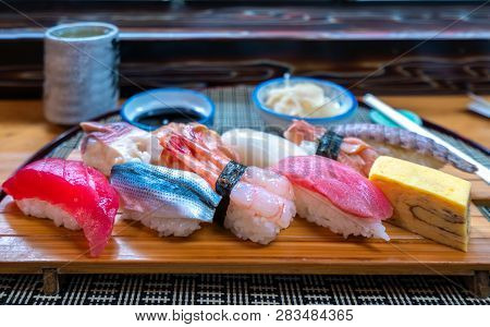 Sushi Set On Wooded Plate In Japanese Seafood Restaurant, This Immage Can Use For Food, Japan, Sushi