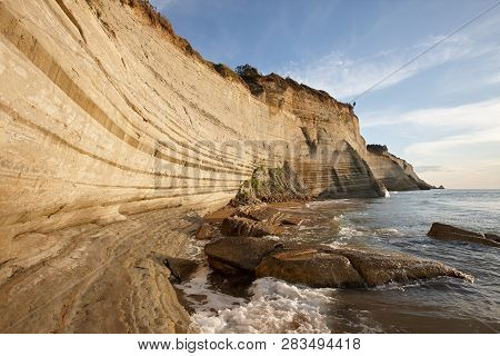 Beautiful Coastline With Cliffs In Corfu, Greece. Unique Geological Formations In Peroulades Region.