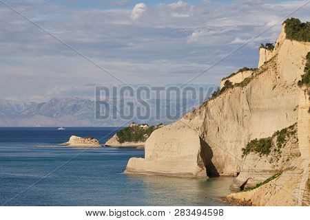 Beautiful Coastline With Cliffs In Corfu, Greece. Unique Geological Formations In Peroulades Region.