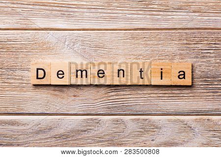 Dementia Word Written On Wood Block. Dementia Text On Wooden Table For Your Desing, Concept