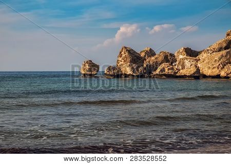 Rock Formation In The Sea. Coast Promontory Seen From Alagadi Beach On Northern Cyprus.