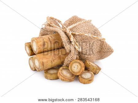 Fresh Burdock Root Or Gobo In Sack On White Background