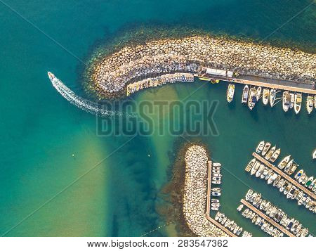 Marina Top Down Aerial View Boat Sailing Off