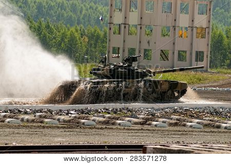 Nizhniy Tagil, Russia - July 12. 2008: Modernized Tank T-80 Moves After Overcoming Of Water Of 1.5 M