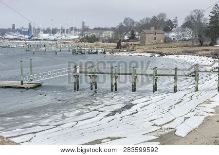 Fairhaven, Massachusetts, Usa - February 4, 2019: Dropping Tide Leaves Broken Ice Along Fairhaven Sh