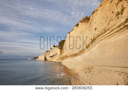Beautiful Coastline With Cliffs In Corfu, Greece. Unique Geological Formations In Peroulades Region.