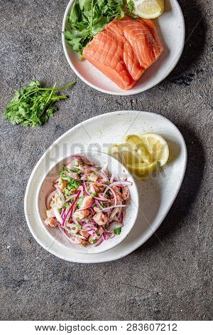 Chilean Salmon Seviche. Fresh Raw Salmon Marinaded With Purple Onion, Coriander In Lemon Juice. Cevi