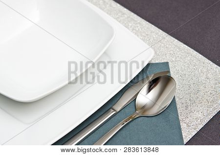 Simple Composition Of White Plates Table Setting