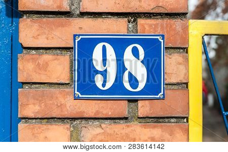 House Address Number, Old Vintage House Address Blue Metal Number 98 Ninety Eight On The Brick Facad
