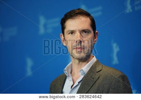 Melvil Poupaud attends the 'By the Grace of God' (Grace a Dieu) photocall at the 69th Berlinale International Film Festival Berlin on February 8, 2019, in Berlin, Germany.   
                        