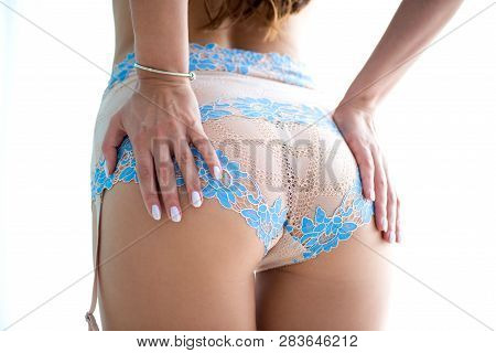 Close Up Half-turned Of Ideal Elastic Flawless Beautiful Womans Ass Wearing Blue Underlinen Underclo