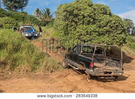 Kapaa, Kauai - January 18, 2019: Abandoned Truck On Beach Being Towed By Garden Island Towing