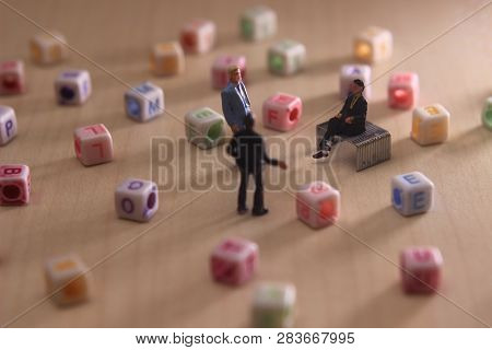 Top View Three Mini Figure Businessman Toy Talking Each Other