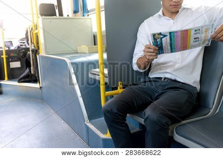 Young Businessman Passenger Use Time In The Bus