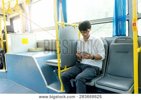 Young Businessman Passenger Use Time In The Bus
