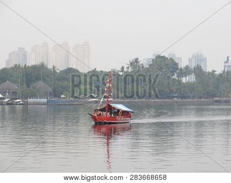 Jakarta, Indonesia - June 12, 2018: Traditional Fishing Boat Sailing On The Sea.