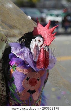 LOS ANGELES - FEBRUARY 9, 2019: Golden Dragon Parade in the streets of China Town Los Angeles. Chico McRooster and his people perform wave and visit with guest at the Chinese New Year celebration.

