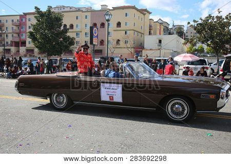LOS ANGELES - FEBRUARY 9, 2019: Golden Dragon Parade in the streets of China Town Los Angeles. Councilman Gil Cedillo waves to the crowd at the Chinese New Year celebration 2019.

