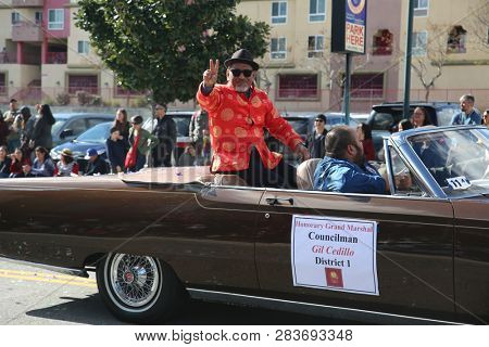 LOS ANGELES - FEBRUARY 9, 2019: Golden Dragon Parade in the streets of China Town Los Angeles. Councilman Gil Cedillo waves to the crowd at the Chinese New Year celebration 2019.

