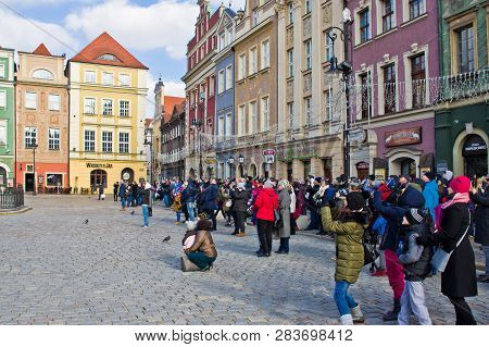 Poznan/poland - February 6th 2019: Crowd Of Tourists Admiring Old Town Square, Taking Photos Of The 