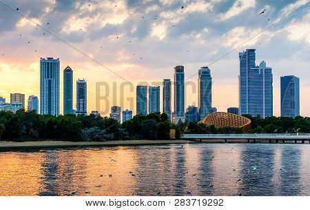 Beautiful Sunset Over Emirate Of Sharjah Skyline In The Uinted Arab Emirates