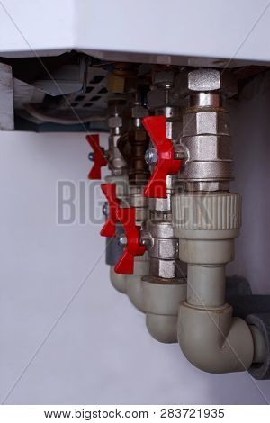 Water Heater System With Taps A Close-up