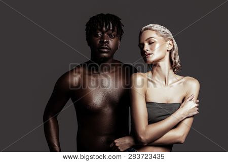 Two Professional Models Representing Diversity Posing Together