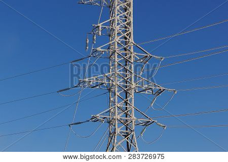 Power Transmission Towers Frostbitten And Coated Hoarfrost.
