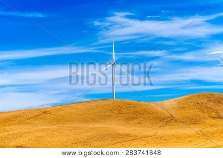 Wind Generators In The Endless Fields.