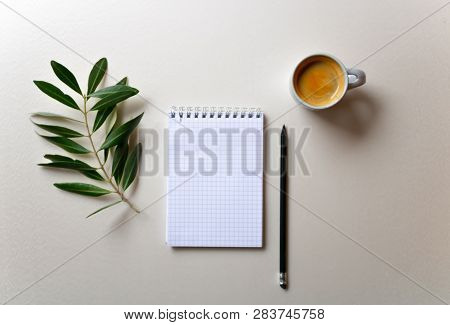 The Composition With The Morning Coffee, Notepad, Pencil And Olive Tree Branch