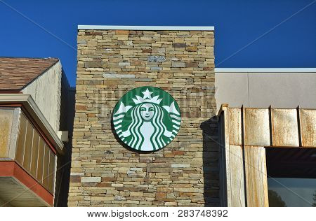 Tusayan, Usa - March 26, 2018: Starbucks Coffee Coffeeshop Logo In Tusayan Town In Arizona.