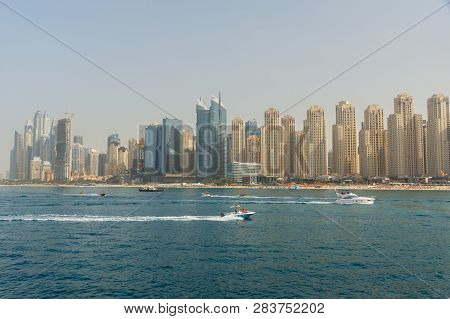 View On Illuminated Burj Khalifa And Dubai Mall At Night From Downtown Dubai